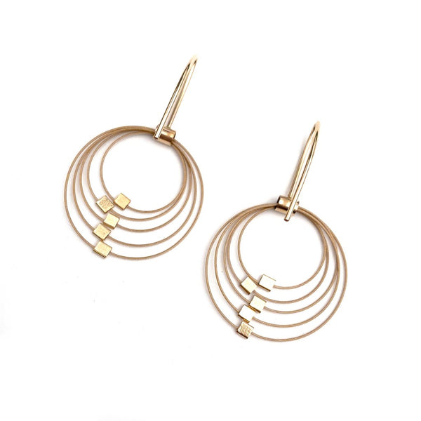 Mini graduated circle hook earrings by Meghan Patrice Riley
