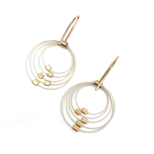 Mini graduated circle hook earrings by Meghan Patrice Riley