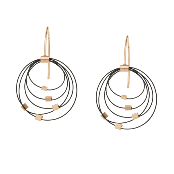 Mini graduated circle hook earrings by Meghan Patrice Riley